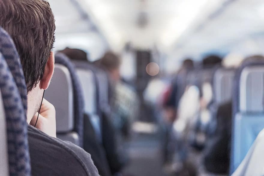 passageiro sentado em aviao